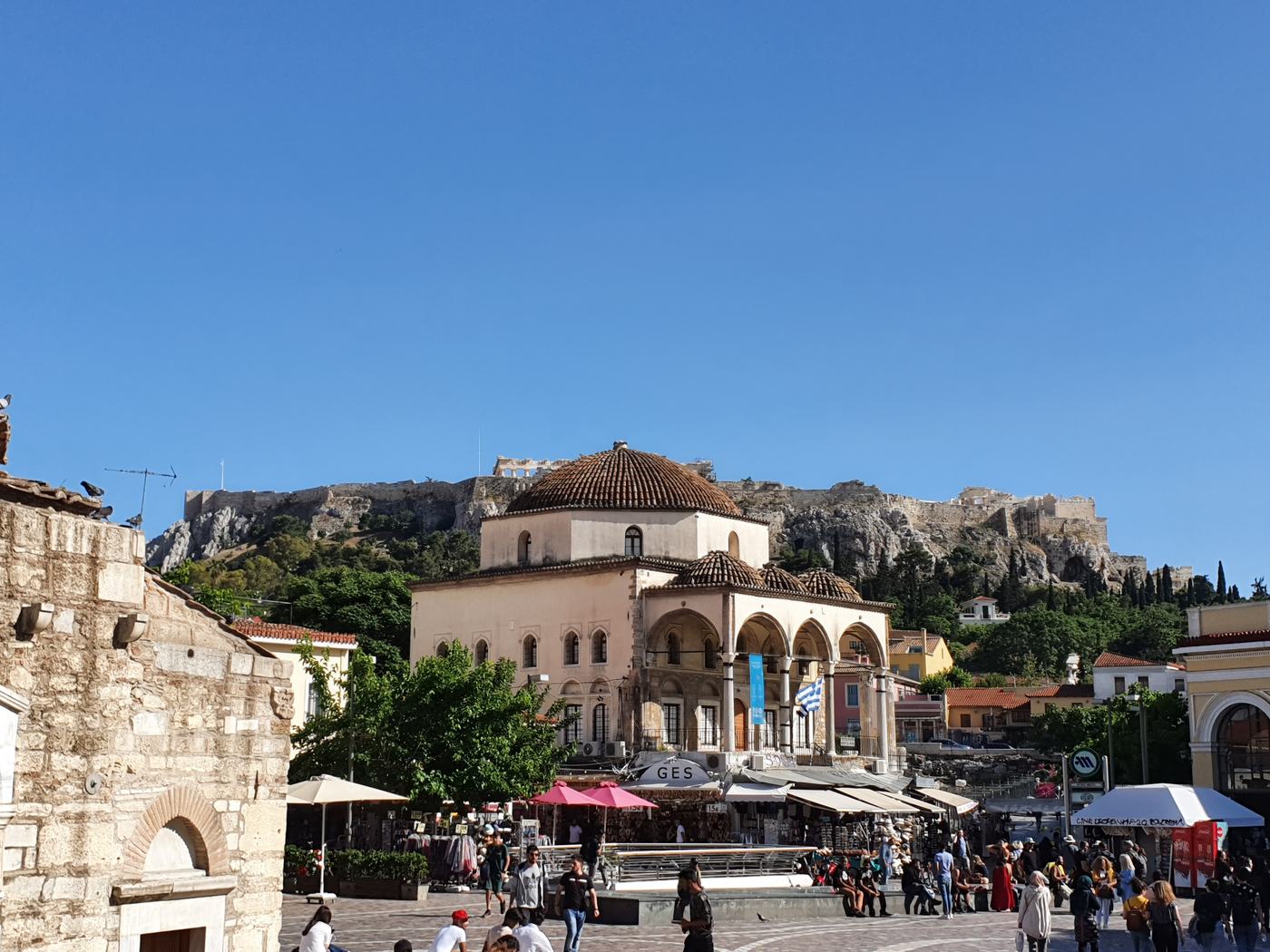 Monastiraki Square with the Acropolis visible for free above the rooftops