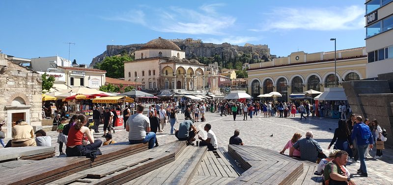 Monastiraki Square in central Athens with the Acropolis and Parthenon visible above the rooftops