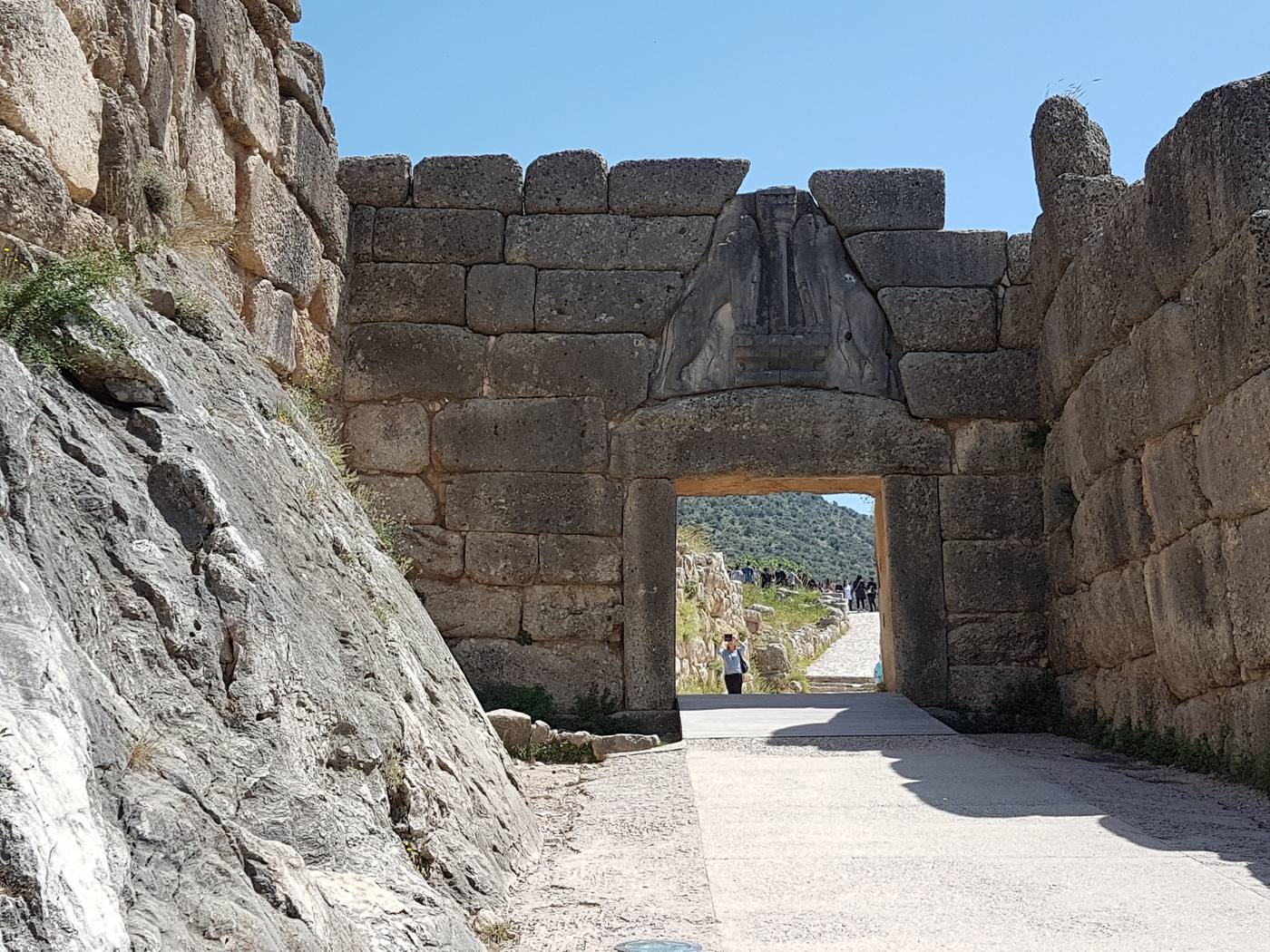 The Lion Gate at Mycenae, its carved relief of two lions flanking a column set above the huge stone lintel